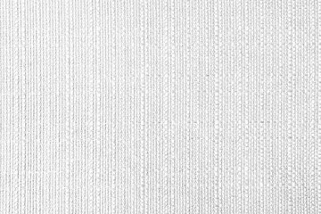 Close-up texture of natural white coarse weave fabric or cloth. Fabric texture of natural cotton or...