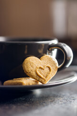 Sweet gingerbread hearts and coffee cup.