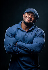 Lifestyle macho man in studio. Fashionable young guy with athletic body.