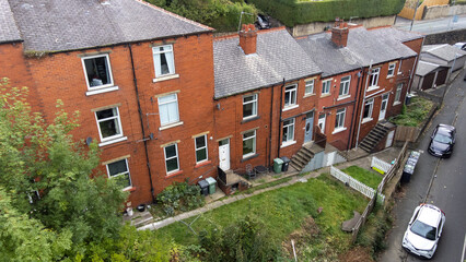 Aerial photo of a typical housing estate in Birkby close to the town centre in Huddersfield, in the Kirklees borough of West Yorkshire showing a typical British row of terrace houses