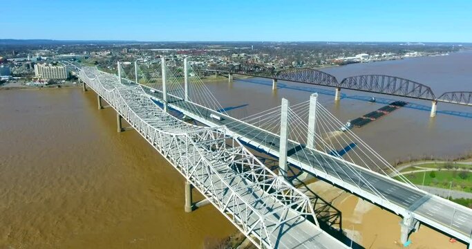 4k aerial louisville kentucky city traffic river bridge flyover circle