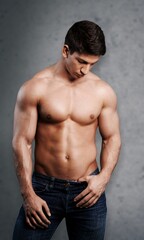 Obraz premium Muscular young handsome man posing