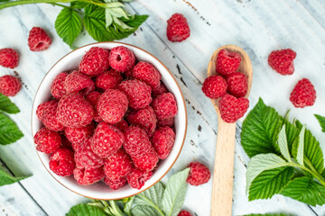 Organic raspberries, Fresh raspberries in bowl. Ripe juicy fresh raspberries. healthy food, vitamins, summer berry fruit. Long banner format. place for text