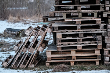 Fototapeta na wymiar Stacks of wooden pallets on site of construction project