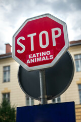 Stop sign with a powerful vegan message