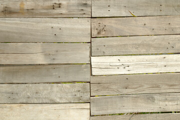 Obraz premium Background of an old wooden wall that forms a fence