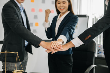 Judge and client shaking hands and lawyers discussing contract papers  after adviced in background at courtroom, lawyer service concept.