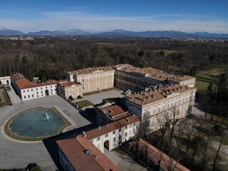 Fototapeta na wymiar Aerial view of facade of the elegant Villa Reale in Monza, Lombardy, north Italy. Birds eye of the beautiful Royal Palace of Monza. Drone photography in Lombardia.