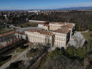 Naklejka premium Aerial view of facade of the elegant Villa Reale in Monza, Lombardy, north Italy. Birds eye of the beautiful Royal Palace of Monza. Drone photography in Lombardia.