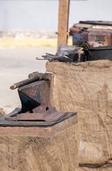 An old iron anvil for forging metal in a smithy or forge,old iron tool