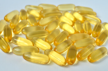 Yellow capsules with omega 3
