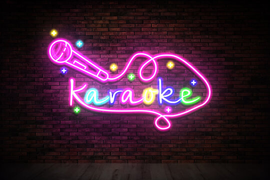 Glowing neon sign with word Karaoke and microphone on brick wall