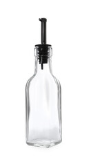 Empty glass bottle with pump for oil on white background