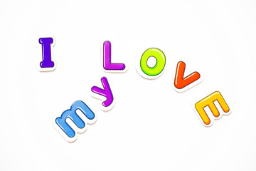 'I love my love' lettering with letter fridge magnets.