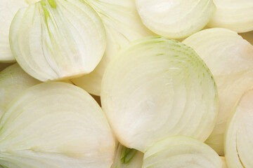 Pieces of fresh ripe onion as background