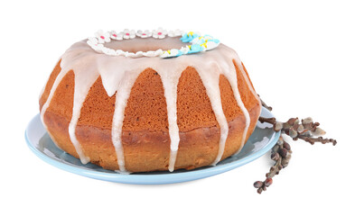 Festively decorated Easter cake and pussy willow branches on white background