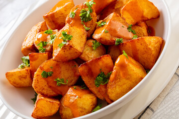 patatas bravas, deep fried potatoes with sauce