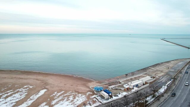 Lake front Michigan from Chicago. Above cars, einter time, flying forward - lake shore drive  Aerial 4k USA