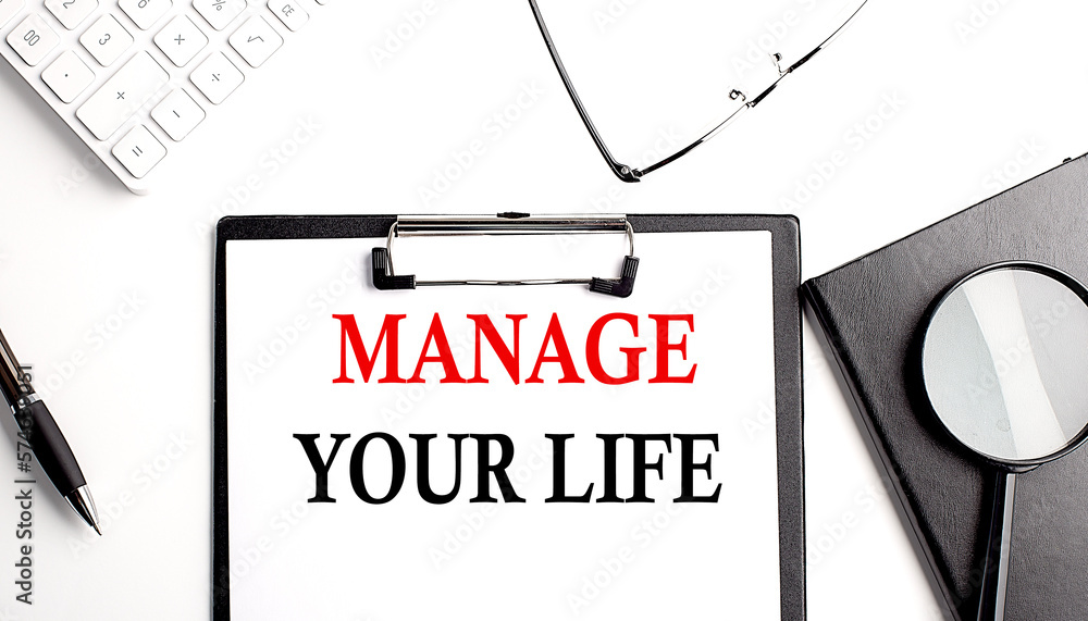 Poster manage your life text written on paper clipboard with office tools