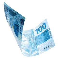 banknote of one hundred reais from brazil falling on isolated white background