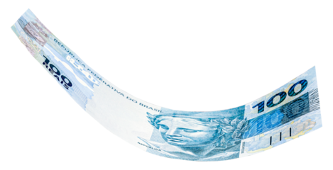 banknote of one hundred reais from brazil falling on isolated white background