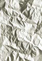 Obraz premium wrinkled white paper. Textured paper background with copy space. Top view