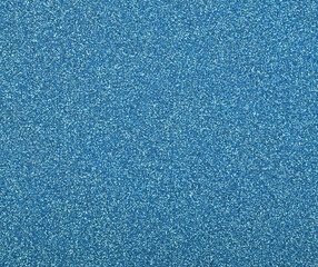 Abstract background texture of blue glitter