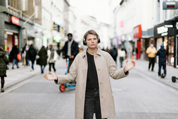 Different in the Crowd - Woman in Her Bubble Listening and Dancing to Music on a Busy City Street