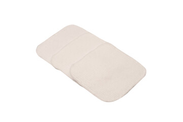 Stack of white cotton sponges isolated on a white background.