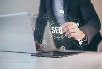 Businessman woks on digital online new marketing business. SEO search engine optimization concept.