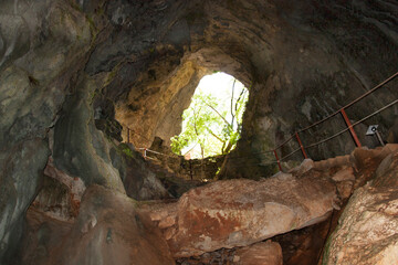 stone arch in mountain cave photo