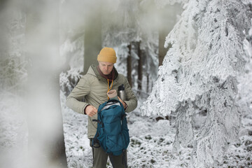 Man in the snowy forest