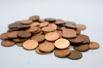 Closeup of a pile of 5 bani RON lei Romanian currency isolated on white