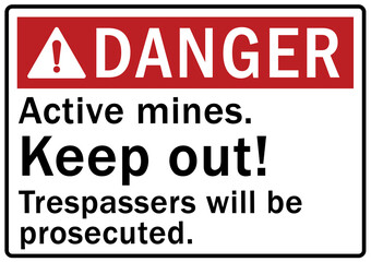 Active mining area danger sign and labels keep out, trespasser will be prosecuted