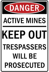 Active mining area danger sign and labels keep out, trespasser will be prosecuted