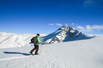 Fototapeta na wymiar Ski tour in the mountains of Kyrgyzstan.