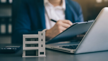 Home Insurance and Real estate investment concept, new client after signing agreement contract with...