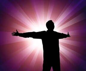 Person silhouette with radial light on color background