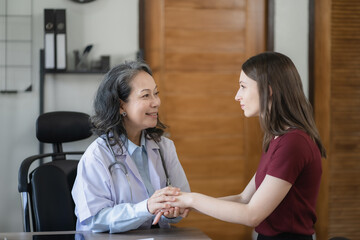 doctor she is encouragement while recommending medications at the clinic.