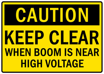 Overhead crane hazard sign and labels keep clear when boom is near high voltage