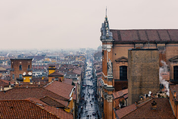 Naklejka premium Aerial panoramic cityscape of Via dell'Indipendenza Bologna, Italy typical houses, ancient buildings and medieval towers