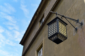 Fototapeta na wymiar Street lamp on the house