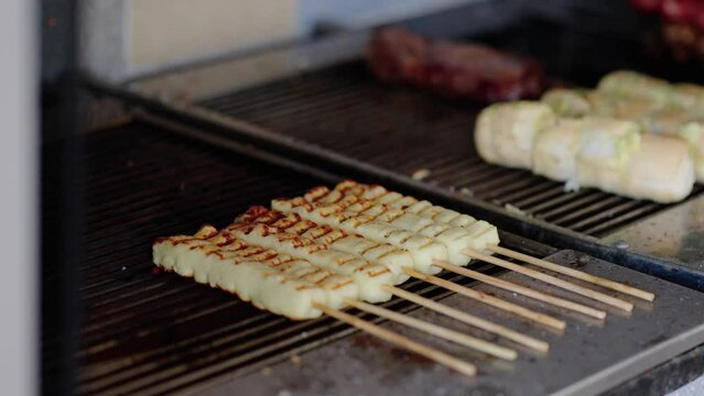 grilled Brazilian "queijo coalho" cheese. Traditional brazilian barbecue
