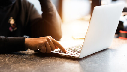 Fototapeta premium Close-up shot of male hands typing on keyboard.