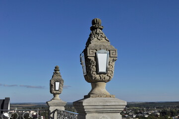 Fototapeta na wymiar beautiful white stone lantern with art decoration on blue sky background
