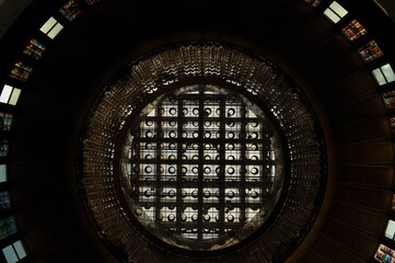 Metallic decorative fence round iron artistic forged bars on glass roof