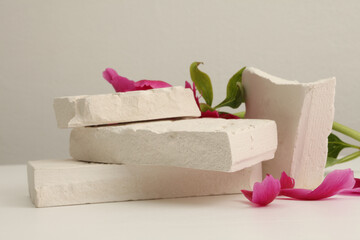 Stones platform podium on beige background. Minimal empty display product presentation scene.