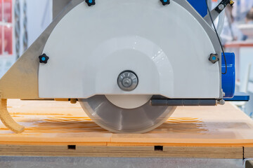Automatic cnc 5 axis bridge circular saw - router profiling system cutting artificial stone at...