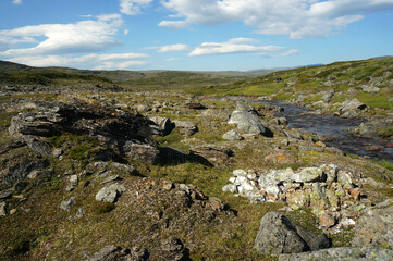 Mountain area with rocks and a stream
