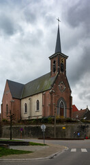 Fototapeta na wymiar Borcht, Flemish Brabant Region - Belgium - The small church and market place of the village